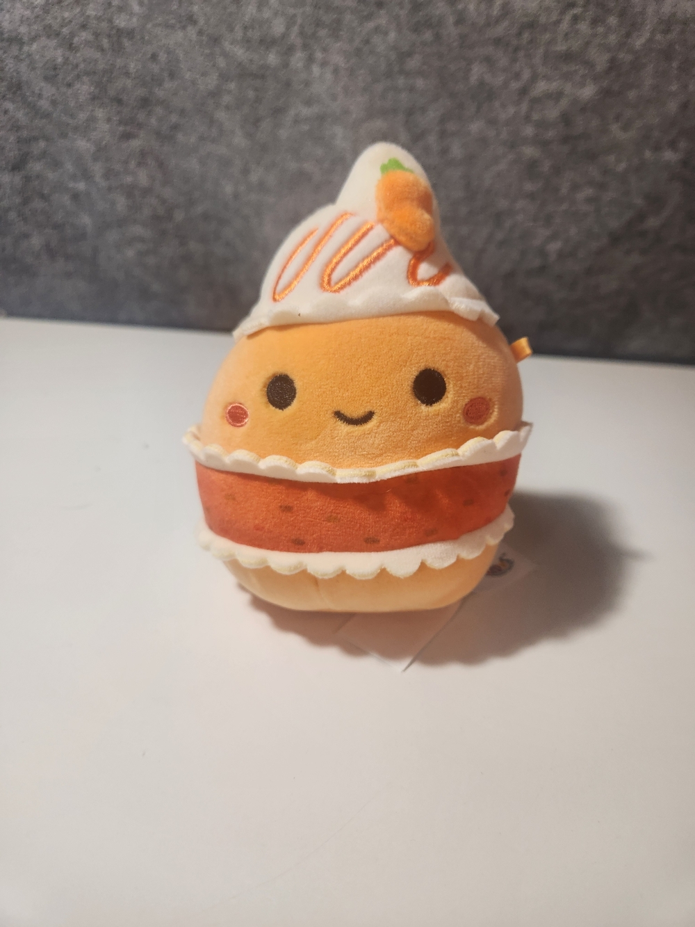 Squishmallows Scooter the Carrot Cake 5in. plush